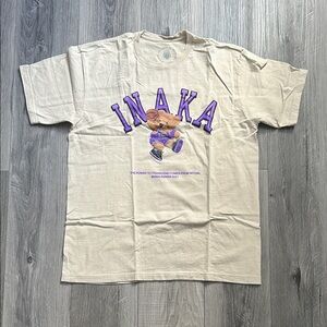 Inaka Powere Beige T-Shirt with Purple Graphic